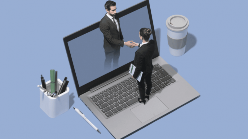 computer and two lawyers shaking hands_amberlo blog image